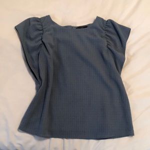 Blue blouse with flutter sleeves